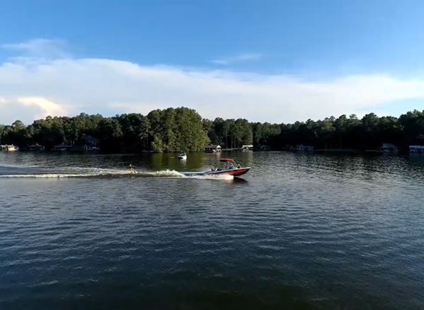 speed boat on lake